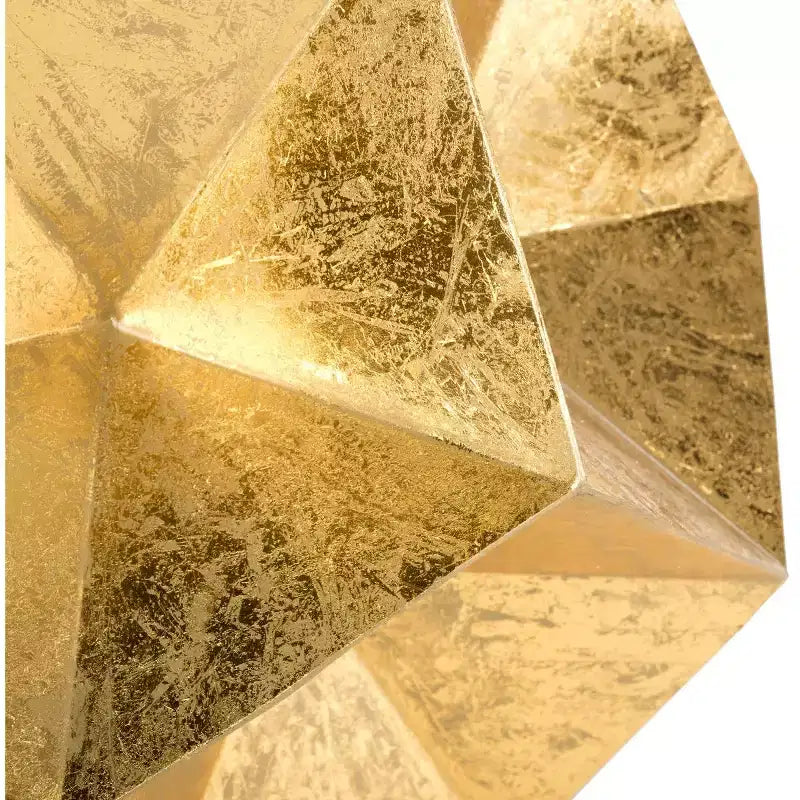 Table d'appoint sculpturale dorée au design géométrique